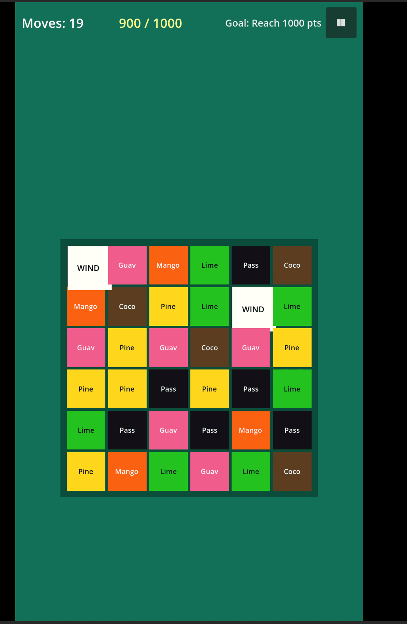 The earliest Tropic Tumble prototype board, a grid of flat coloured squares with fruit names typed on them, plus white WIND power tiles